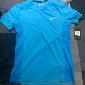 Nike running shirt.